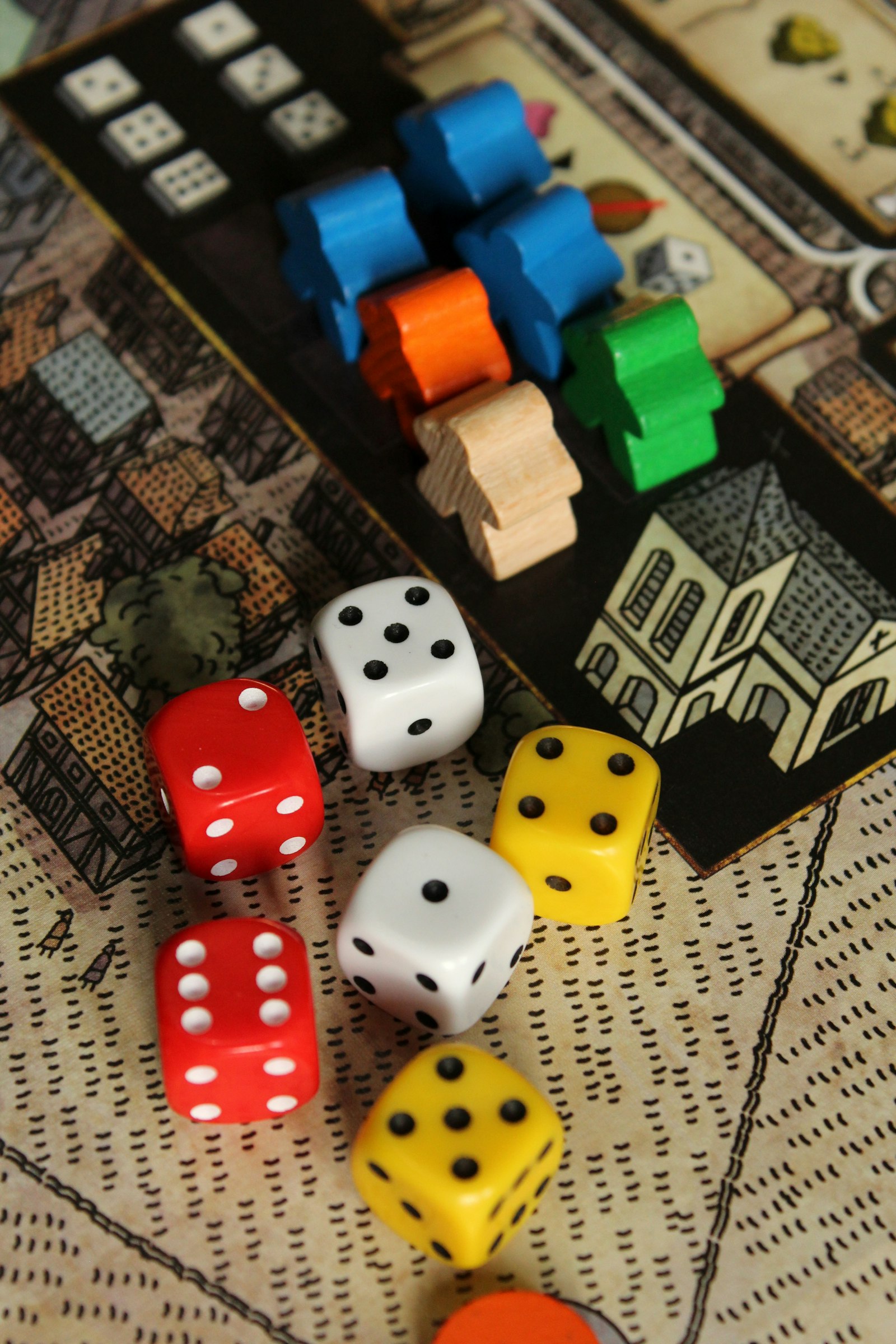Mystery board game table with cards, tokens, and campaign notes