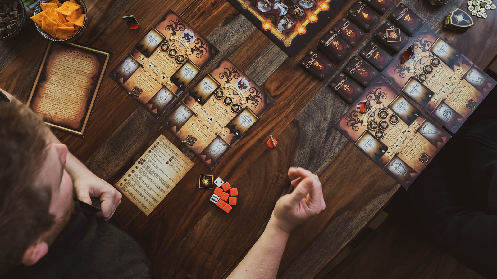 Colorful tabletop board game pieces and dice for community prediction play